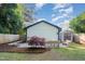 Backyard featuring a well-maintained lawn, shed and patio area at 206 Bickett Blvd, Raleigh, NC 27608