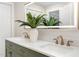 Modern bathroom with double sinks, quartz countertops, and stylish fixtures at 206 Bickett Blvd, Raleigh, NC 27608
