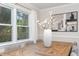 Dining room featuring a wood table, hardwood floors, and decorative art at 206 Bickett Blvd, Raleigh, NC 27608