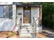 Charming front porch with a modern railing at 206 Bickett Blvd, Raleigh, NC 27608