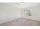 Inviting bedroom with neutral carpet, natural light, and a serene atmosphere at 210 Silas St, Durham, NC 27705