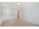 Comfortable bedroom with neutral carpet, double closets, and access to an en-suite bathroom at 210 Silas St, Durham, NC 27705