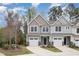 Charming townhome featuring a one car garage and neutral siding at 210 Silas St, Durham, NC 27705