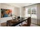 Bright home office area with a large window and unique modern furnishings at 214 Oak Barrel St, Smithfield, NC 27577