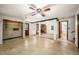 Open basement area with a wood-burning stove, tile flooring, and convenient access to a bathroom at 2417 Lawrence Dr, Raleigh, NC 27603