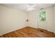 Bedroom with wood floors and a bright window at 2417 Lawrence Dr, Raleigh, NC 27603