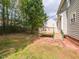 Spacious backyard with a wooden deck and patio, perfect for outdoor activities at 2424 Horizon Hike Ct, Raleigh, NC 27603