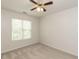 Bedroom featuring neutral walls, carpeting, and a bright window at 2424 Horizon Hike Ct, Raleigh, NC 27603