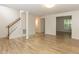 Spacious living room featuring hardwood floors and neutral paint at 2424 Horizon Hike Ct, Raleigh, NC 27603