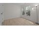 Bright bedroom with a large window and neutral walls, perfect for relaxation at 2941 Golden Oak Ct Ct, Raleigh, NC 27603