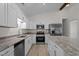 Kitchen features stainless steel appliances and granite countertops at 2941 Golden Oak Ct Ct, Raleigh, NC 27603