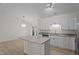 Kitchen featuring island with granite countertops and stainless steel appliances at 2941 Golden Oak Ct Ct, Raleigh, NC 27603