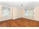 Bedroom featuring hardwood flooring, cream colored walls and natural light at 305 N Ellis Ave, Dunn, NC 28334