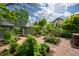 A brick patio, lush plants, shed, and hot tub are visible in this backyard creating a perfect retreat at 315 Oakwood Ave, Raleigh, NC 27601