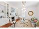 Inviting living room features built in shelving surrounding a fireplace, lots of natural light, and hardwood floors at 315 Oakwood Ave, Raleigh, NC 27601