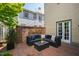 Charming brick patio with cozy seating, perfect for outdoor relaxation and entertaining at 315 Oakwood Ave, Raleigh, NC 27601