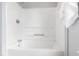 Shower with bright white tub and shower head with shower door at 315 Oakwood Ave, Raleigh, NC 27601