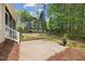 Backyard featuring a patio, verdant lawn, and access to the screened in porch at 341 Heather Bluffs Dr, Garner, NC 27529