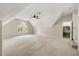 Spacious bedroom featuring a large window, a ceiling fan, and neutral carpeting at 341 Heather Bluffs Dr, Garner, NC 27529