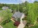 Exterior view of a inviting home with manicured lawn and mature landscaping adding to its curb appeal at 341 Heather Bluffs Dr, Garner, NC 27529
