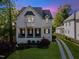 Charming two-story home with landscaped yard and inviting front porch at 3513 Bellevue Rd, Raleigh, NC 27609