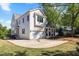 Charming two-story home with a well-manicured lawn, large driveway, and attached garage at 3513 Bellevue Rd, Raleigh, NC 27609