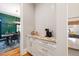 Convenient coffee bar area off the kitchen with marble countertops and custom cabinetry at 3513 Bellevue Rd, Raleigh, NC 27609