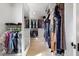 Walk-in closet featuring clothing and accessories hanging on rods and stacked on shelves at 3513 Bellevue Rd, Raleigh, NC 27609
