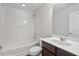 Well lit full bathroom with large vanity and tub/shower at 36 Argonaut Dr, Durham, NC 27705
