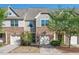 Charming townhome featuring stone accents, attached garage, and well-maintained landscaping at 36 Argonaut Dr, Durham, NC 27705