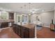 Well-lit kitchen with a center island and stainless steel appliances at 36 Argonaut Dr, Durham, NC 27705