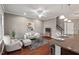 Inviting living room features a cozy seating area, modern decor, and beautiful hardwood floors at 36 Argonaut Dr, Durham, NC 27705