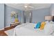 Comfortable main bedroom featuring a ceiling fan, stylish bench, and relaxing decor at 36 Argonaut Dr, Durham, NC 27705