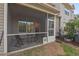 View of screened in patio from the backyard at 36 Argonaut Dr, Durham, NC 27705