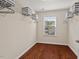 Walk-in closet featuring wire shelving for ample storage with a window providing natural light at 36 Argonaut Dr, Durham, NC 27705
