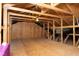 Unfinished attic space showing exposed rafters and plywood subflooring ready to be converted to living space at 409 Courthouse Dr, Morrisville, NC 27560
