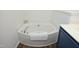 Close-up of a soaking tub, featuring a clean, white design and comfortable amenities at 409 Courthouse Dr, Morrisville, NC 27560