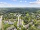 Picturesque neighborhood featuring well-kept homes, tree-lined streets, and convenient parking areas at 4210 Brynwood Ave, Durham, NC 27713