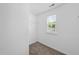 Bright closet space featuring neutral carpet and a window for natural light at 4210 Brynwood Ave, Durham, NC 27713