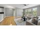 Inviting living room with hardwood floors, neutral tones, and a cozy seating arrangement at 4210 Brynwood Ave, Durham, NC 27713