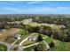 An aerial view showcasing the property's generous lot size and beautiful surroundings within a well-maintained neighborhood at 4304 S Greg Allen Way, Oxford, NC 27565