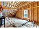 Exposed beams and insulation in an attic space ready to be transformed and customized for any homeowner's needs at 4304 S Greg Allen Way, Oxford, NC 27565