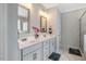Bright bathroom featuring double sinks, white marble counters and flooring at 4304 S Greg Allen Way, Oxford, NC 27565