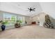 Bonus room featuring an abundance of light, a ceiling fan, and views to the exterior at 4304 S Greg Allen Way, Oxford, NC 27565