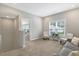 Upstairs living room with natural light and plenty of space for comfortable seating at 4304 S Greg Allen Way, Oxford, NC 27565