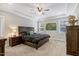 Spacious main bedroom featuring carpet, tray ceilings, recessed lights and natural light at 4304 S Greg Allen Way, Oxford, NC 27565