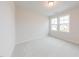 Bedroom with a window allowing natural light to illuminate the space at 501 Willard Woods Dr, Wendell, NC 27591