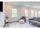 Well-lit living room features modern decor and comfortable seating at 501 Willard Woods Dr, Wendell, NC 27591