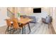The living room features contemporary furniture and stylish floors at 501 Willard Woods Dr, Wendell, NC 27591