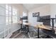 Modern home office featuring two workstations with natural light and contemporary decor at 501 Willard Woods Dr, Wendell, NC 27591